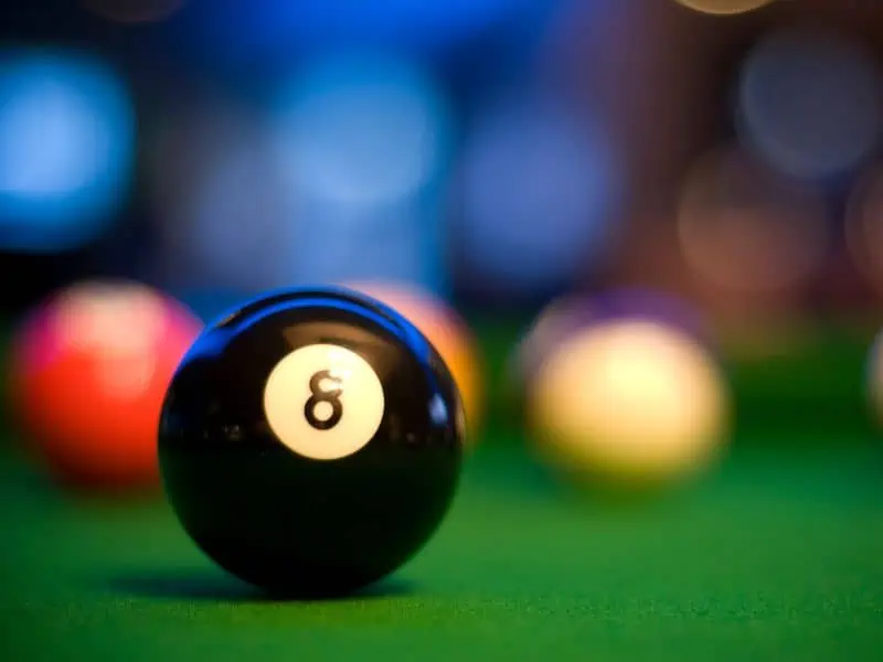8 Ball on billiards table 8 Ball on billiards table